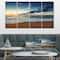 Designart - Sunrise and Glowing Waves in Ocean - Seascape Canvas Art Print